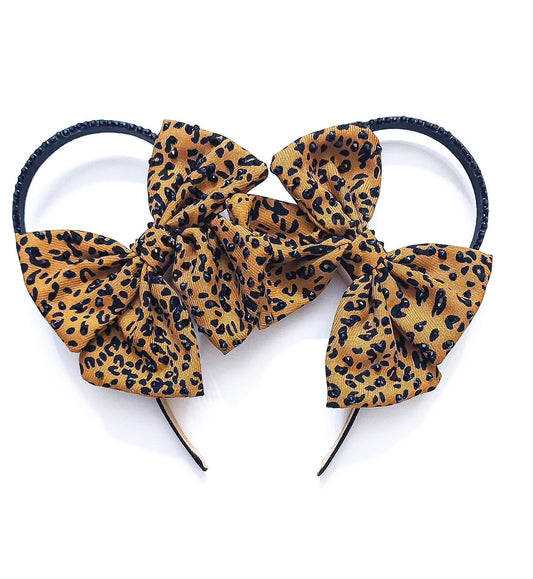 Animal print bow with black rhinestones w/ Black ring black rhinestone 3d ears . Animal Kingdom ears . Cheetah print leopard print ears